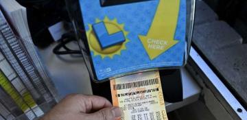 Two Californians win nearly $1m each in Powerball, jackpot soars to $1.7B