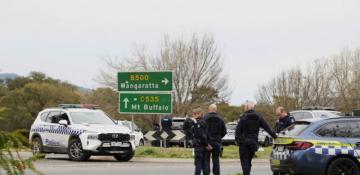 Australia offers $1 million bounty for suspect in police killings