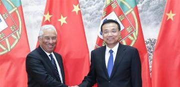 China, Portugal pledge to enhance cooperation, safeguard free trade 