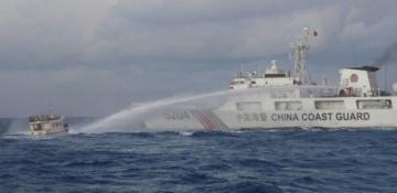 China fires water cannon at Philippine ships near Scarborough Shoal