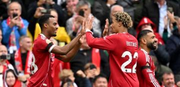 Liverpool extends perfect start with derby win over Everton