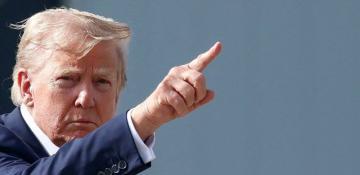 Man charged with shining laser at Trump’s Marine One helicopter 