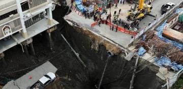 Massive sinkhole in Bangkok street prompts evacuations