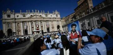 Tens of thousands flock to the Vatican as teenager is canonized as the Church’s first millennial saint