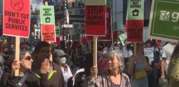 Thousands rally in Toronto to 'draw the line' against PM Carney agenda 