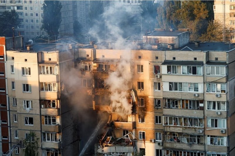 Russia launches largest air attack on Ukraine, government building set ablaze