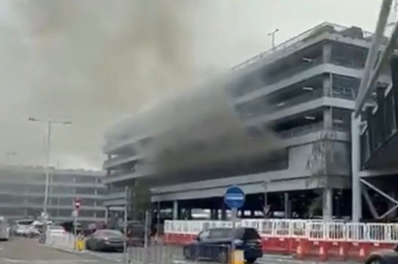 Car park fire at Heathrow Airport sparks travel chaos -  VIDEO 