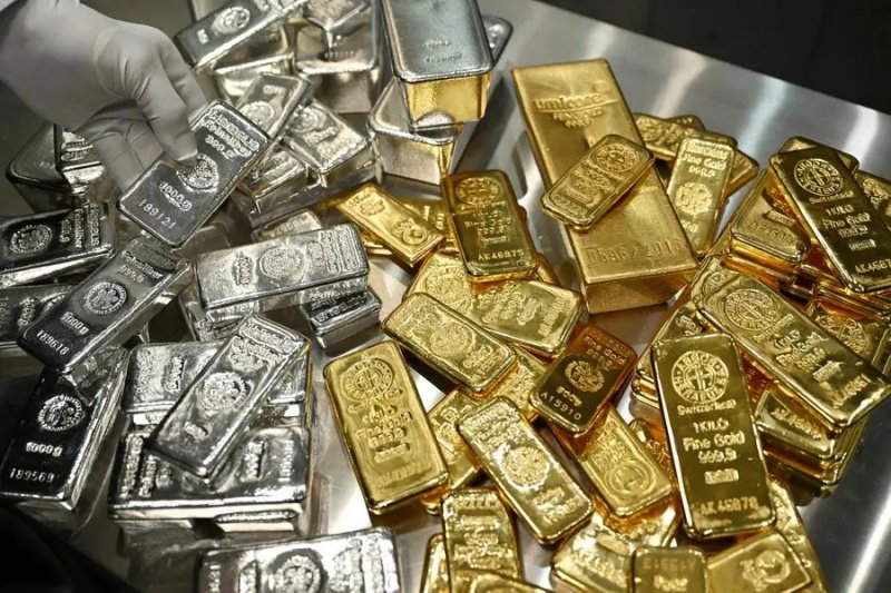 Gold, silver extend record run as investors seek safety amid trade threats