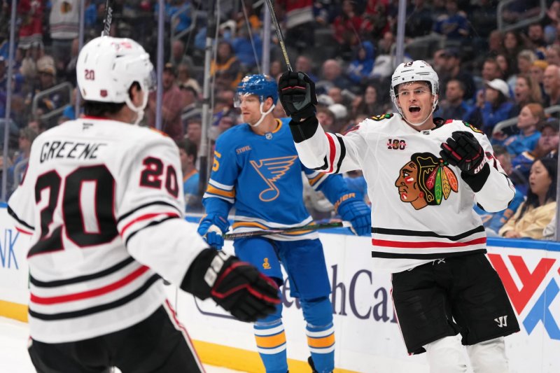 Reichel shines as Blackhawks crush Blues 8-3
