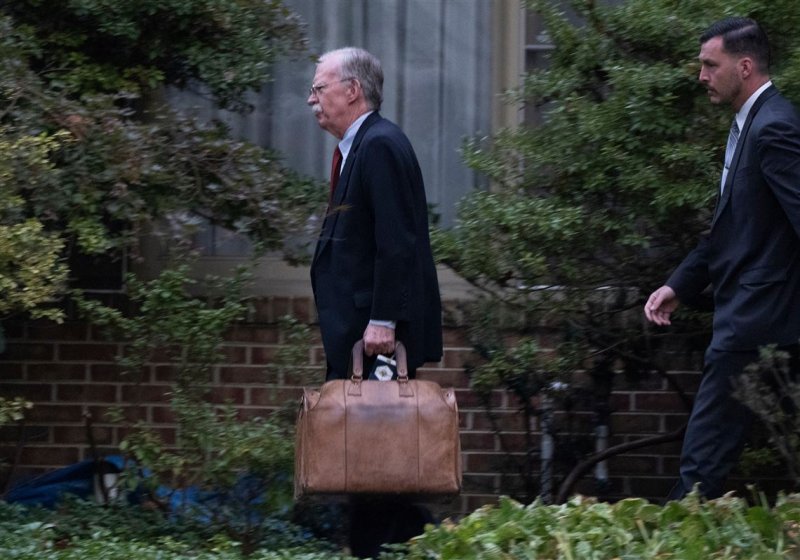 Ex-Trump adviser John Bolton surrenders to authorities after federal indictment