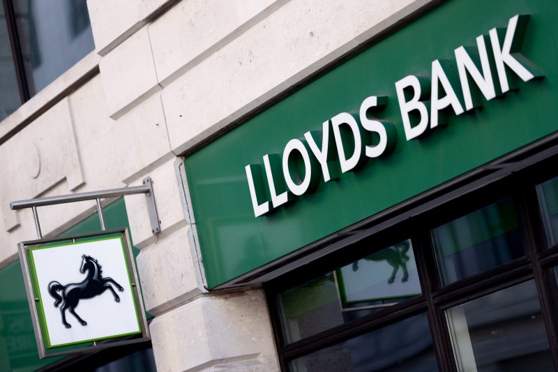 Lloyds profits tumble amid car loan scandal