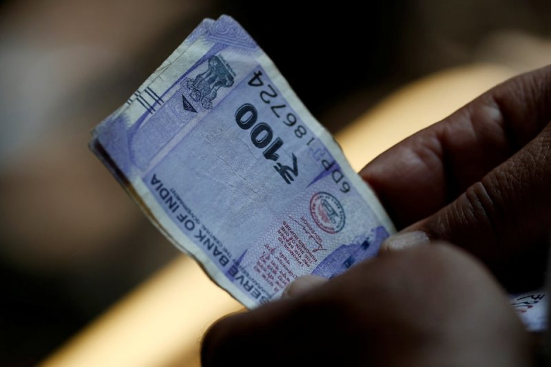 Indian rupee falls to two-week low on fed hawkish tone