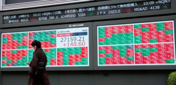 Japanese stocks surge to record high after ruling party picks Sanae Takaichi