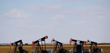 Oil prices gain as OPEC+ opts for cautious output hike