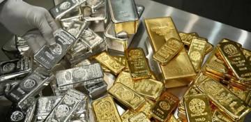 Gold, silver extend record run as investors seek safety amid trade threats