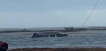 Watch:  House swept out to sea as typhoon batters Alaska