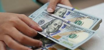 US dollar poised for biggest weekly drop in over three months