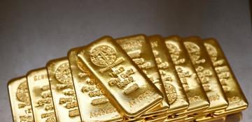 Gold heads for first weekly loss since May