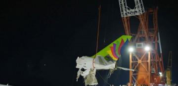 Hong Kong retrieves black boxes from deadly plane crash