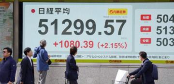 Japan's Nikkei hits record high amid tech rally