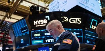 U.S. stocks close lower as investors digest tech earnings 