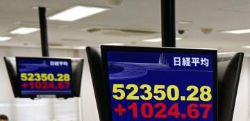 Tokyo stocks hit record highs, Nikkei tops 52,000 on tech rally