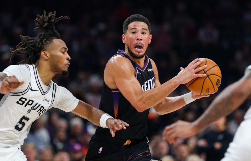Suns hand Spurs first loss as Devin Booker shines in 130–118 victory