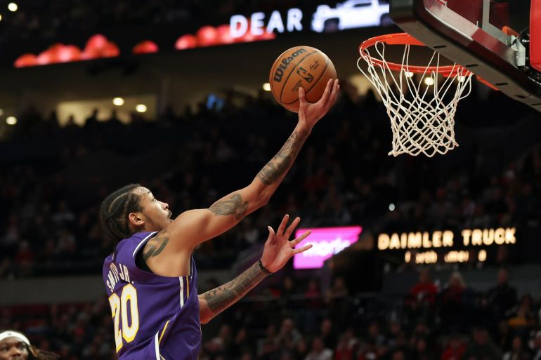 Short-handed Lakers outlast Trail Blazers in Portland