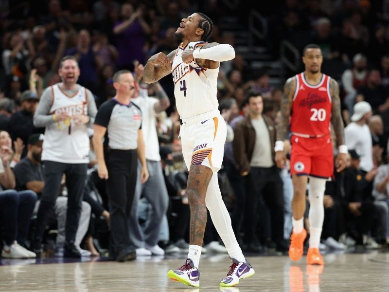 Green shines in season debut as Suns defeat Clippers 115–102