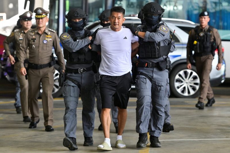 Thailand extradites gambling kingpin She Zhijiang to China