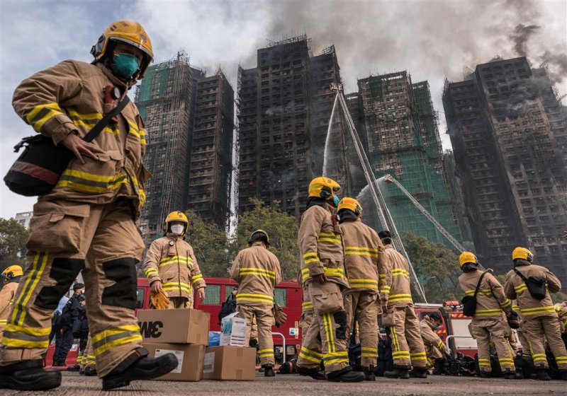 83 dead as Hong Kong firefighters battle burning towers for 2nd day