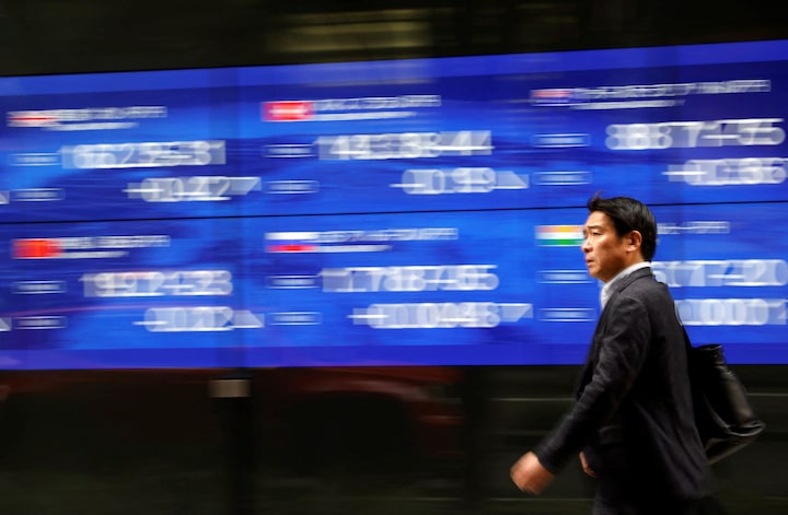 Asian shares firm as Fed cut bets lift sentiment 