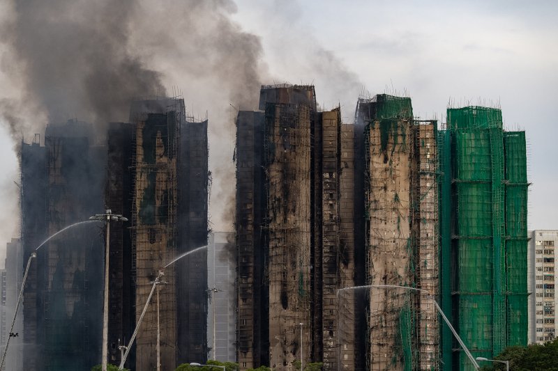 Hong Kong fire death toll climbs to 128