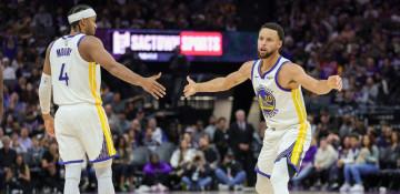 Curry, Moody power Warriors past Suns 118–107