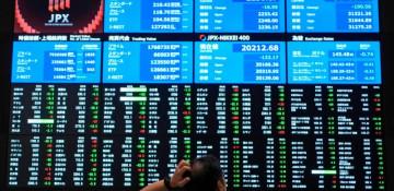 Asian shares surge as Wall Street gains on strong earnings