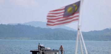 Malaysia searches for missing Rohingya after boat sinks, death toll rises to 21 