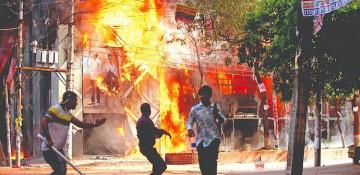 Bangladesh raises alert following bomb attack on Yunus' bank and arson in Dhaka