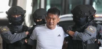 Gambling tycoon suspect extradited to China for trial