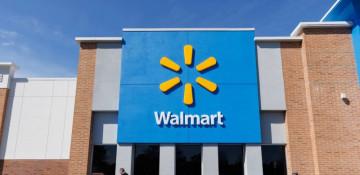 Walmart raises full-year outlook after earnings beat; shares dip