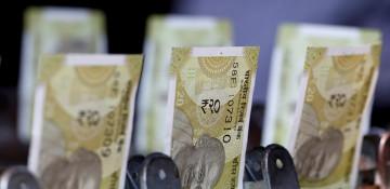 Indian rupee edges higher as Asian currencies gain, interbank dollar selling supports