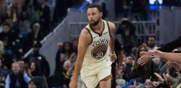 Curry scores 31 as Warriors overpower Jazz 134-117