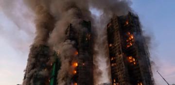 At least 4 dead after massive fire engulfs Hong Kong residential high-rise buildings