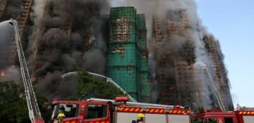 Fire at Hong Kong apartment complex fully extinguished