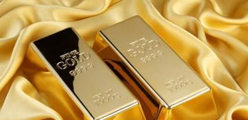 Gold subdued as dollar firms; spotlight on Fed minutes, US jobs data 