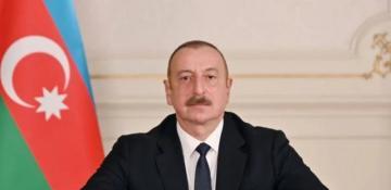 Ilham Aliyev shares post on National Flag Day 