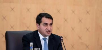 Hikmat Hajiyev shares post on National Flag Day 