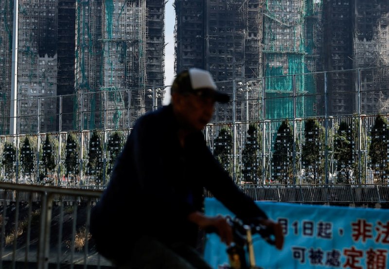 Hong Kong launches judge-led probe after deadly fire 