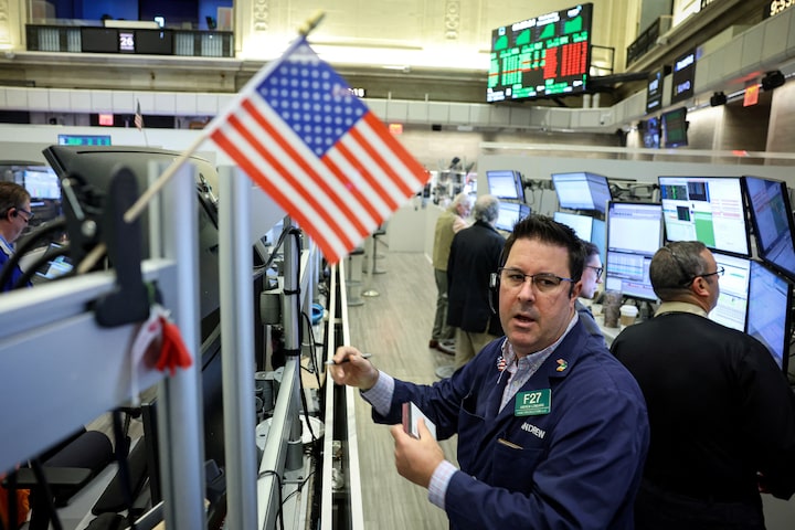 Wall Street futures hold steady ahead of new economic data 