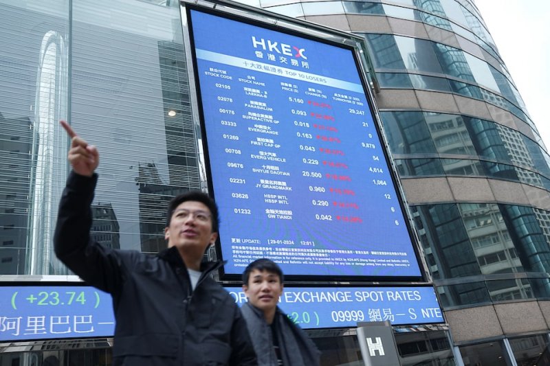 Asia stocks surge; gold and silver hit record highs 
