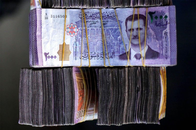Syria introduces new banknotes after redenomination
